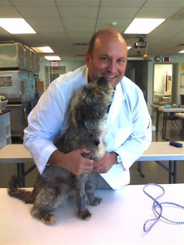 Gallery Image Dr._Norman_Bayne_with_Terrier.jpg