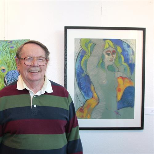 Bob Carter with his painting, Members Show.