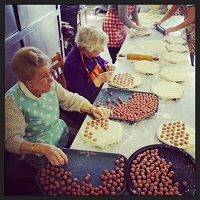 LWC Women's Event Committee making traditional "koldunai" dumplings with meat.