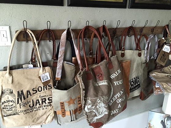 A specialty of Vyntage Barn is their beautiful totes! They don't stay on the shelves very long!