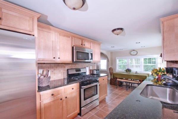 Kitchen with maple cabinets and granite counter tops