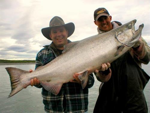 Guide Adam Reid, a client, and King Salmon Guide Adam Reid, a client, and King Salmon