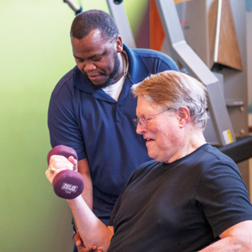 Caregiver helping client stay active and healthy.