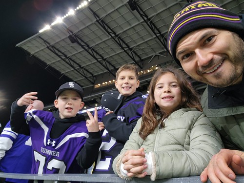 Andre Bohall with his kids at the Sumner High School @ Puyallup High School rival game
