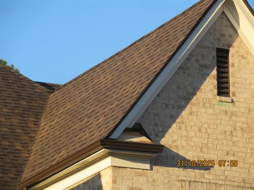Hand-nailed roof installation built to stand up to Memphis weather — quality and precision that define every Lucius project.