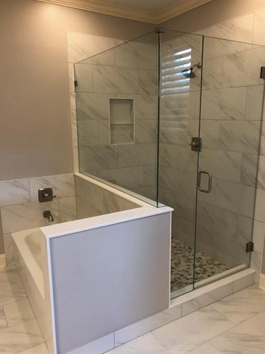 Modern bathroom remodel with custom tile shower and premium fixtures — built for comfort, craftsmanship, and everyday luxury.