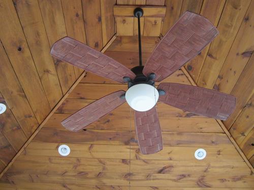 Vaulted ceiling with warm wood tones and modern lighting — part of a Lucius Complete Home renovation focused on craftsmanship and detail.