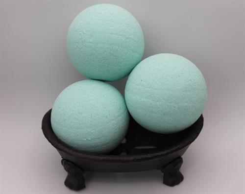 Locally made, small-batch bath bombs — pictured in our refreshing Seashore Paradise scent. Handmade with care right here in Bartlett.