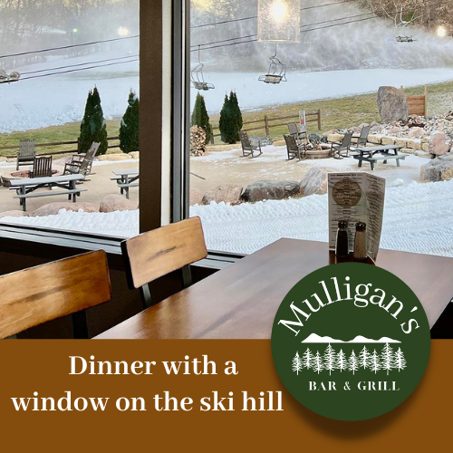 Get your window seat on the ski and tubing hills at Mulligan's in Christmas Mountain Village
