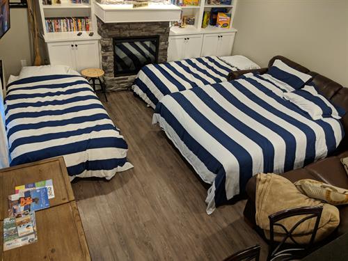 Harbor side room with twin XL air mattresses setup.