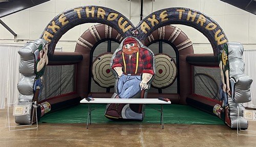 Check your aim with our Lumberjack Axe Throwing Interactive Inflatable.