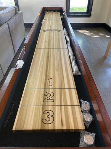 Shuffleboard table and games