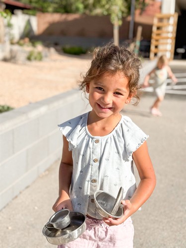 Spark learner playing outside at Acton Academy St. George