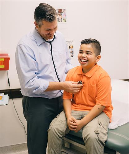 Dr. Page with young patient