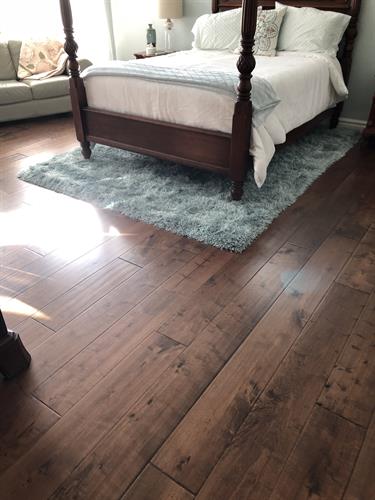 Beautiful hand scrapped hardwood flooring installed in Hurricane, Utah From moving furniture and virtually dust free removal to a perfect install, completed by new baseboards installed and a final cleaning! #theflooringstudio #heidiberlin #stgeorgeflooring