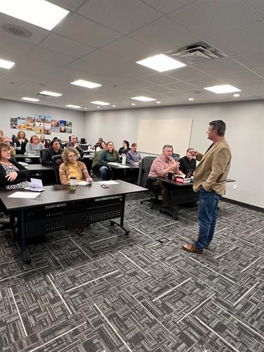 Ethan speaking at a Creative Advantages Lunch & Learn. Ethan speaking at a Creative Advantages Lunch & Learn.