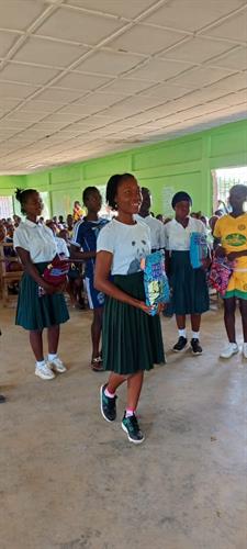 Happy students with new washable sanitary supplies, Lofa County Liberia.