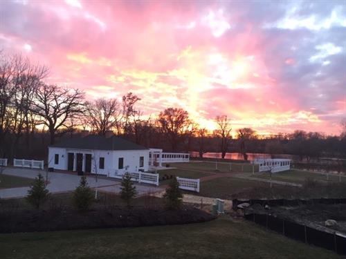 Sunset over the Garden Lodge and pond