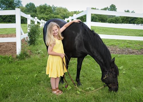 young girl with her horse