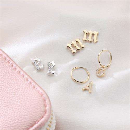We love giving initial jewelry as a personalized gift!  Our Gothic Style Initial Earrings are available in both diamond or non-diamond style 14K gold earrings. These are sold by the single earring so you can build your perfect personalized pair. 