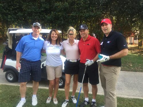 Our CEO & Founder,Joan, with golfers from the TechBridge Golf Tournament in 2016!