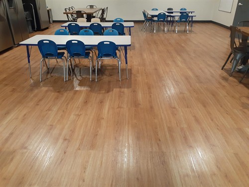 LVT llooring after deep cleaning/machine scrubbing and applying Diversey WiWax