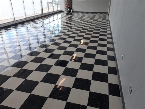 We'll strip and wax or scrub and reoat with wax your VCT! Photo is one of our customer's lobby.