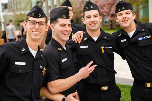 Cadets smiling on campus