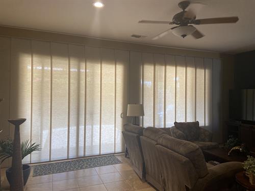 One of the best products for sliding glass doors, Skyline by Hunter Douglas, gives you privacy and UV protection while allowing light to diffuse into the home. 
