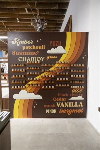 Chicano Candle Co Candle Bar in Downtown Indio Scent Wall