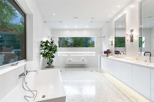 Custom frame less shower units and mirrors.