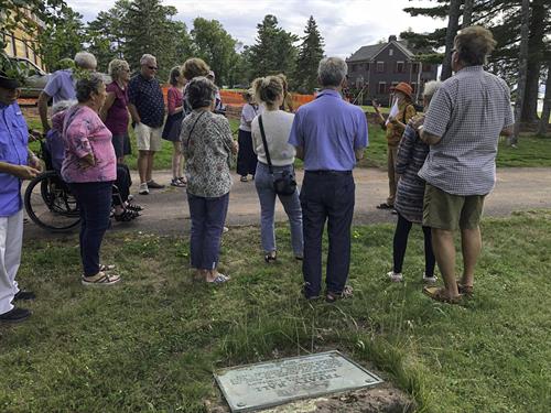 Friends learn about Treaty Hall on Annual Meeting walking tour,