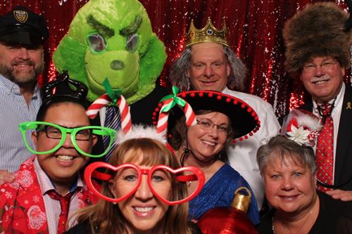 Looking to add some fun to your next holiday party!!! Everyone loves the holidays and getting photos with your work family is extra fun.  