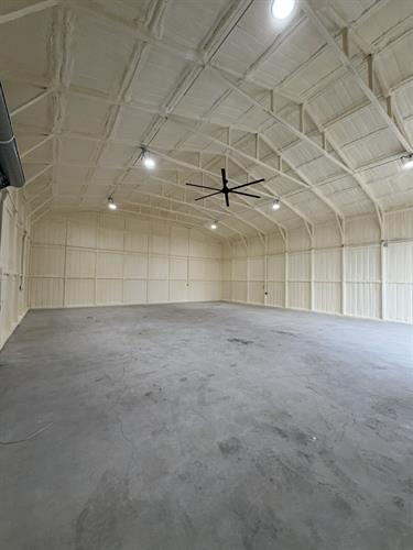 Closed-cell spray foam insulation for metal buildings—improving energy efficiency, moisture control, and structural strength.