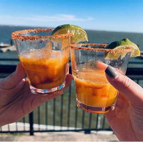 Savor the moment with Primos Tex-Mex Grille's crafted cocktails - where every sip is a celebration. Join us and toast to great times and unforgettable memories!"