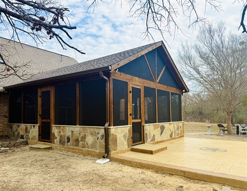 Screened in Patio cover with stamped concrete