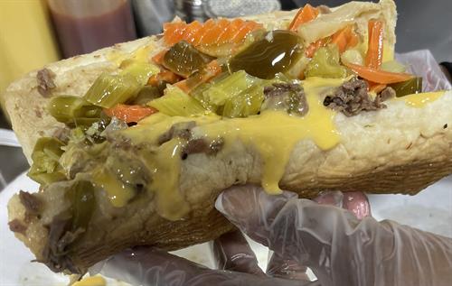 Italian Beef with Giardiniera peppers and cheese sauce