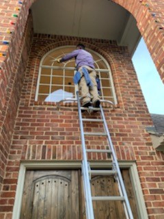 Cleaning tall windows