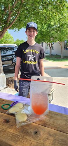 Lemonade Day.   One of our star performers.   Logan is his name.