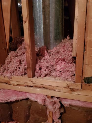 Insulation touching chimney pipe