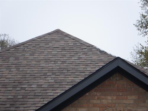 Wind-damaged roof 