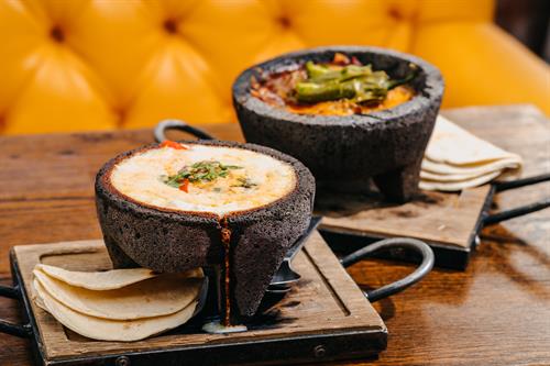 Flaming Fundido in 400 Degree Molcajete Bowl