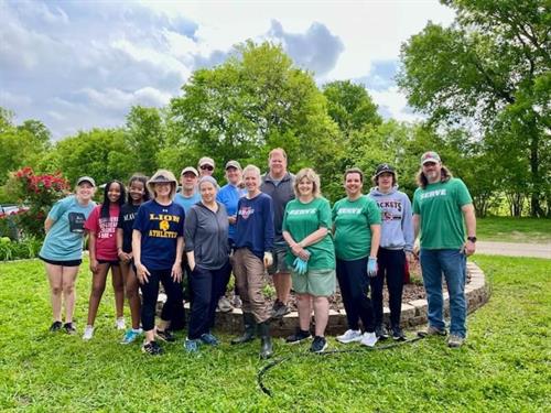 Volunteers hard at work blessing us by pulling weeds and planting beautiful flowers in the butterfly garden