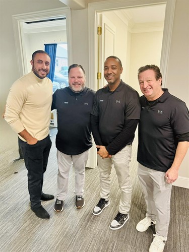 Gallery Image Harlow_Texas_Execs_with_Chirs.jpg