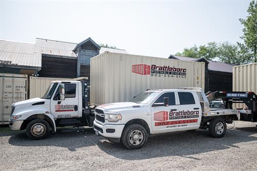 Shipping container delivery trucks