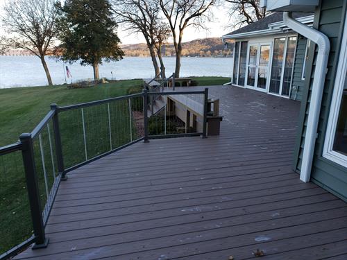 Large deck connected to a house overlooking Lake Wisconsin