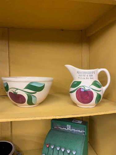 Bowl and matching pitcher with apple pattern at St. Vincent De Paul's