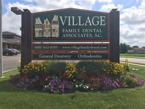 Village Family Dental outdoor sign with logo