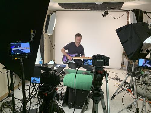 behind the scenes of guitarist photoshoot