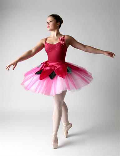 Ballerina pointe dancer posing in studio by Ziegler Photography